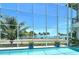 Enclosed pool with stunning water views, and a patio at 121 Seagull Ln, Sarasota, FL 34236