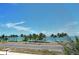 Stunning water view with palm trees and road at 121 Seagull Ln, Sarasota, FL 34236