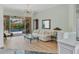 Light and airy living room showcasing a view of the pool at 4452 Mcintosh Lake Ave, Sarasota, FL 34233