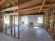 Partially renovated living room ready for customization, featuring original ceiling and abundant natural light at 8010 Marina Dr, Holmes Beach, FL 34217