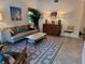 Mid-century modern living room with comfortable seating at 8010 Marina Dr, Holmes Beach, FL 34217