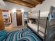 bedroom with bunk beds, built in closet and bathroom at 8010 Marina Dr, Holmes Beach, FL 34217