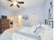 Light and airy bedroom with a view of the home office at 13202 Torresina Ter, Bradenton, FL 34211