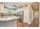 Kitchen boasts granite countertops and stainless steel appliances at 13202 Torresina Ter, Bradenton, FL 34211