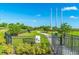 Fenced dog park with waste disposal and seating at 5209 Lake Overlook Ave, Bradenton, FL 34208