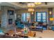 Relaxing clubhouse with a fireplace and water views at 5209 Lake Overlook Ave, Bradenton, FL 34208