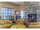 Community Lobby with stone fireplace and comfortable seating at 5209 Lake Overlook Ave, Bradenton, FL 34208