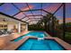 Stunning screened pool and spa with beautiful sunset views at 5209 Lake Overlook Ave, Bradenton, FL 34208