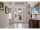 Foyer with view of the backyard through a glass door at 5209 Lake Overlook Ave, Bradenton, FL 34208