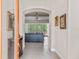 Bright foyer with view into living room and tile floors at 5209 Lake Overlook Ave, Bradenton, FL 34208