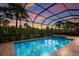 Enjoy stunning sunset views from this screened pool and spa at 5209 Lake Overlook Ave, Bradenton, FL 34208