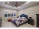 Spacious bedroom with king-size bed and window shutters at 5209 Lake Overlook Ave, Bradenton, FL 34208