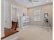 Home office features built-in shelving and window shutters at 5209 Lake Overlook Ave, Bradenton, FL 34208