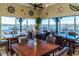 Community clubhouse dining area with water views and nautical decor at 5209 Lake Overlook Ave, Bradenton, FL 34208