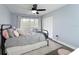 Bright bedroom with a queen-size bed and ample closet space at 6100 12Th S St # 220, St Petersburg, FL 33705