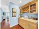 A well-equipped wet bar with cabinets and a sink at 219 81St St, Holmes Beach, FL 34217