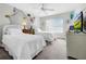 Bedroom with two twin beds and TV at 219 81St St, Holmes Beach, FL 34217