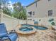 Inviting pool and spa area, perfect for relaxation and entertaining at 219 81St St, Holmes Beach, FL 34217