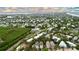 Wide aerial view showing the home and surrounding neighborhood at 219 81St St, Holmes Beach, FL 34217