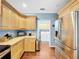 Kitchen boasts stainless steel appliances and laundry access at 219 81St St, Holmes Beach, FL 34217
