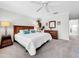 Bright bedroom featuring a king-size bed, neutral color palette, and ample closet space at 219 81St St, Holmes Beach, FL 34217