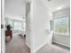Upstairs hallway offering access to bedrooms and a view of a bedroom at 219 81St St, Holmes Beach, FL 34217