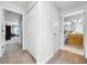 Hallway with linen closet and bathroom access at 219 81St St, Holmes Beach, FL 34217