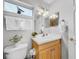 Small bathroom with single sink vanity at 219 81St St, Holmes Beach, FL 34217
