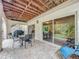 Outdoor patio with seating area and access to backyard at 219 81St St, Holmes Beach, FL 34217