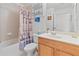 Neat bathroom with a shower/tub combo and updated vanity at 4850 51St W St # 4204, Bradenton, FL 34210