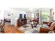 Living room with leather sofa, TV, and fireplace at 4850 51St W St # 4204, Bradenton, FL 34210