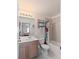 Well-maintained bathroom with a shower/tub combo and wood vanity at 4850 51St W St # 4204, Bradenton, FL 34210