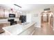 Bright kitchen features granite counters, stainless appliances, and an island perfect for Gathering gatherings at 7380 Mikasa Dr, Punta Gorda, FL 33950
