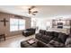 Open concept living room and kitchen with natural light and tiled floors at 7380 Mikasa Dr, Punta Gorda, FL 33950