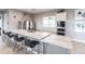 Modern community kitchen featuring a large island and stainless steel appliances at 7380 Mikasa Dr, Punta Gorda, FL 33950