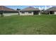 Large backyard with plenty of space for outdoor activities at 7380 Mikasa Dr, Punta Gorda, FL 33950
