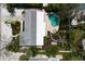 Aerial view of property showcasing the pool and lush landscaping at 506 69Th St, Holmes Beach, FL 34217
