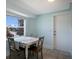 Charming dining area offers a cozy space with a table and chairs, complemented by a window offering pleasant views at 506 69Th St, Holmes Beach, FL 34217