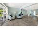 Open-concept living room filled with natural light, creating a warm and welcoming ambiance for relaxation and entertainment at 506 69Th St, Holmes Beach, FL 34217