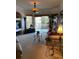 Spacious living room with comfortable seating and access to balcony at 5146 Northridge Rd # 201, Sarasota, FL 34238