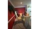Elegant dining room with a glass table and four chairs at 5146 Northridge Rd # 201, Sarasota, FL 34238