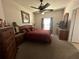 Bright bedroom with a comfortable bed and ample storage at 5146 Northridge Rd # 201, Sarasota, FL 34238