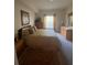 Spacious bedroom with king-size bed and ample closet space at 5146 Northridge Rd # 201, Sarasota, FL 34238