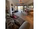 Bright living room featuring sliding doors to balcony at 5146 Northridge Rd # 201, Sarasota, FL 34238