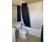 Clean bathroom with shower/tub combo and vanity at 5146 Northridge Rd # 201, Sarasota, FL 34238