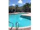 Resort-style pool with ample lounge chairs at 5146 Northridge Rd # 201, Sarasota, FL 34238