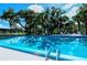 Inviting community pool with ample deck space at 3225 Duncan Way, Sarasota, FL 34239