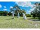 Three abstract sculptures in a grassy area at 3225 Duncan Way, Sarasota, FL 34239