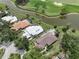 Luxury homes situated along a canal and golf course at 424 Cardiff Rd # 27, Venice, FL 34293