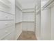 Large walk-in closet with ample shelving and hanging space at 424 Cardiff Rd # 27, Venice, FL 34293
